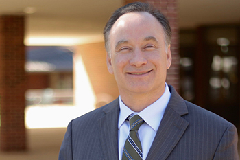 Dr. Elliot Hirshman
